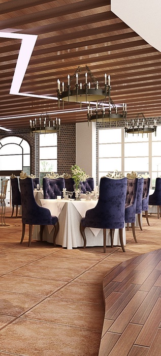 grote ruimte met wit opgedekte tafels en blauwe stoelen in een restaurant